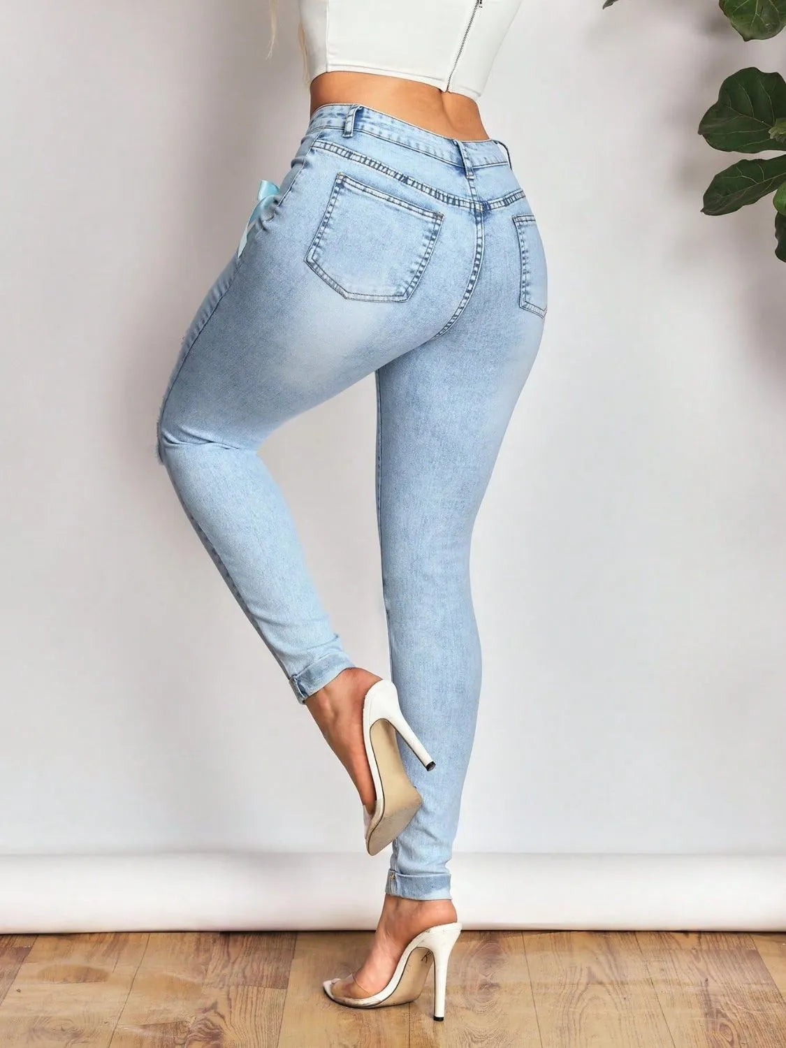Bow Distressed Skinny Jeans